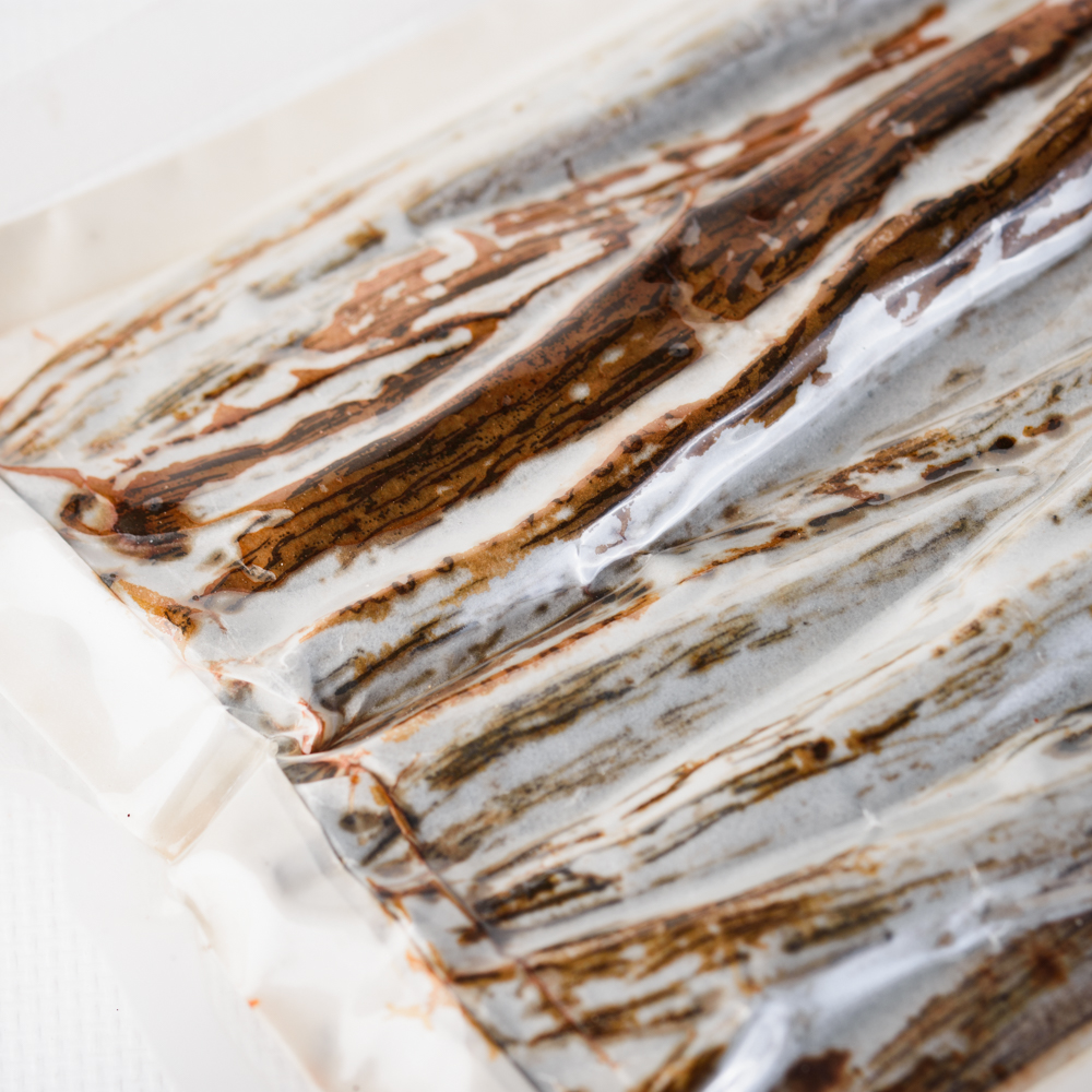 Gros plan sur le sachet de 40 Gousses de Vanille Bourbon Noire Gourmet d'Aromabe